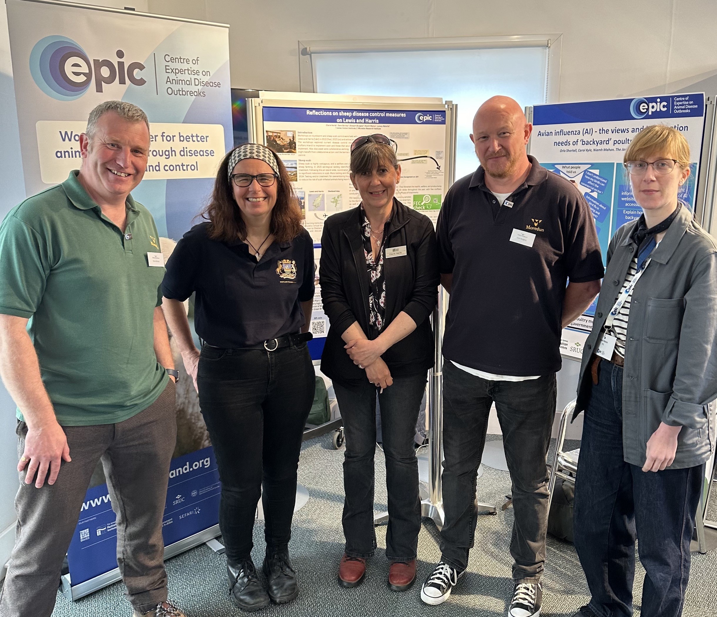 Sheep Scab discussion presenters pose for a photo in front of the EPIC stand.